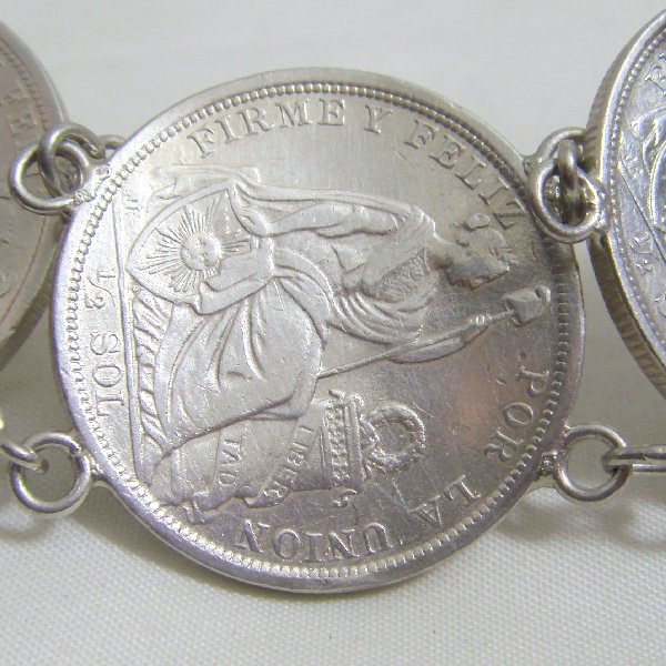 (b1108)Silver bracelet with Peruvian coins.